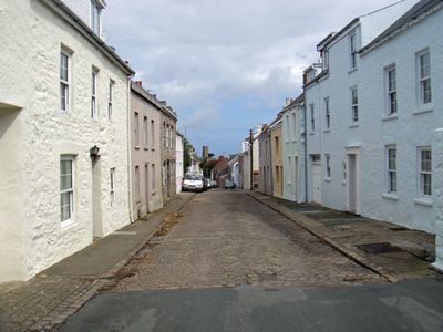 Little Street on Alderney, with Elisabeth Beresford's house on the right Little Street on Alderney, with Elisabeth Beresford's house on the right