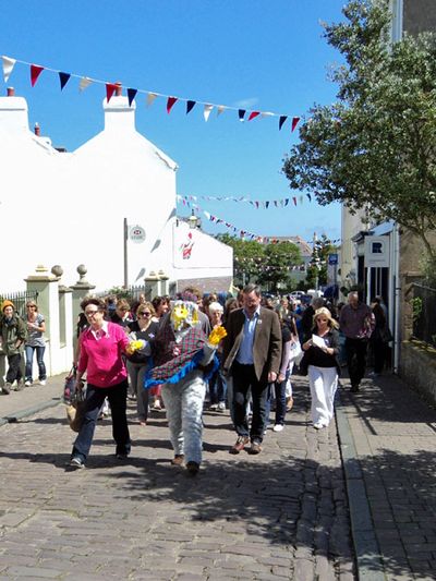 Street procession up Victoria Street to the Wombles exhibition