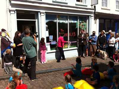 Kate Robertson cuts the ribbon to officially open the Wombles exhibition