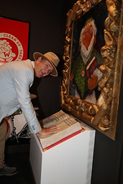 Marcus takes the Womble pledge Marcus takes the pledge with his hand in the Womble handprint